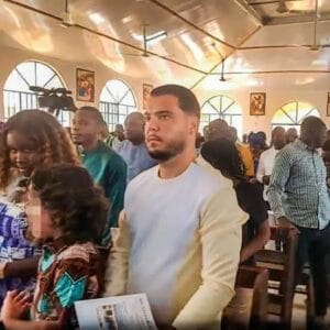 Jos Leijdekkers, also known as Bolle Jos, pictured attending a church service in Tihun, Sierra Leone, on 1 January 2025.